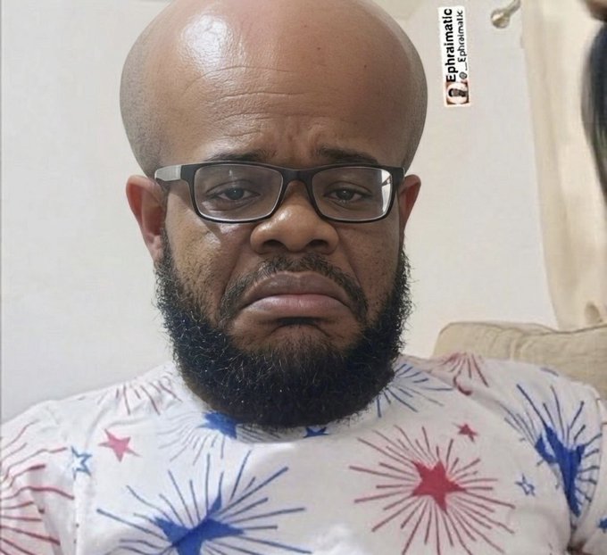 A selfie of a bald man with a full black beard wearing glasses and a white patterned shirt, with a TikTok watermark from @ephriimatic_ visible in the upper right.