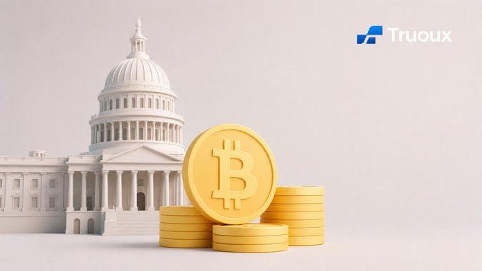 The image features a large golden coin sitting next to four stacks of yellow coins. The coin is positioned at the center of the scene, with the stacks of coins surrounding it from all sides. In the background, there's a white building that appears to be the U.S. Capitol in Washington D.C., and the text "TRUOUX" can also be seen on the image. The post seems to be promoting Bitcoin as a form of digital gold or currency, with the Capitol building serving as an example of how governments are embracing this new technology.