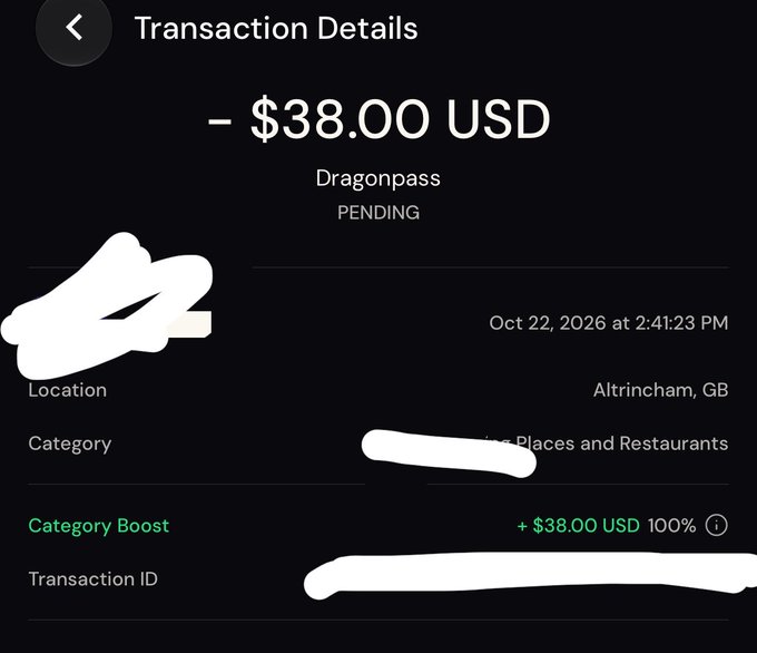 A dark transaction-details screen shows a pending -$38.00 USD Dragonpass transaction dated Oct 22, 2026 at 2:41:23 PM in Altrincham, GB, categorized as Places and Restaurants, with parts of the merchant and transaction ID obscured.