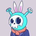 A cartoon illustration of a blue alien-like character with bunny ears and antennae wearing a brown jacket.