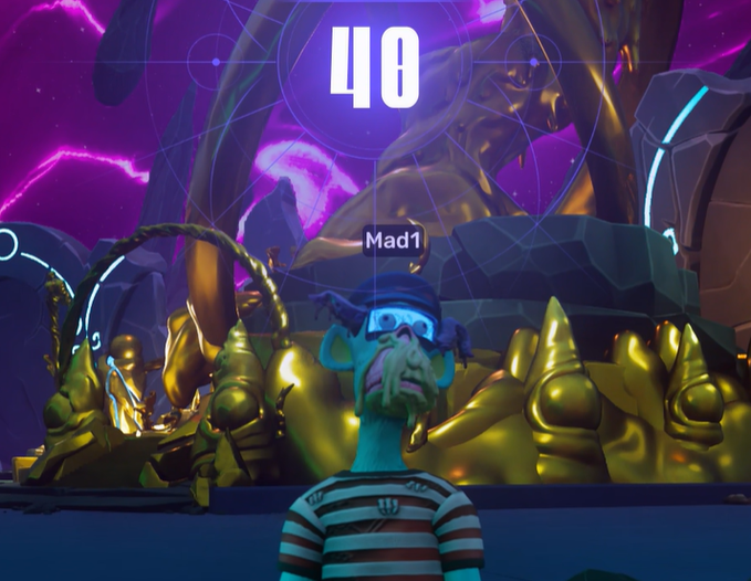 A video game character named 'Mad1' with a blue face, green beard, and striped shirt stands before a glowing golden statue with the number '40' displayed above.