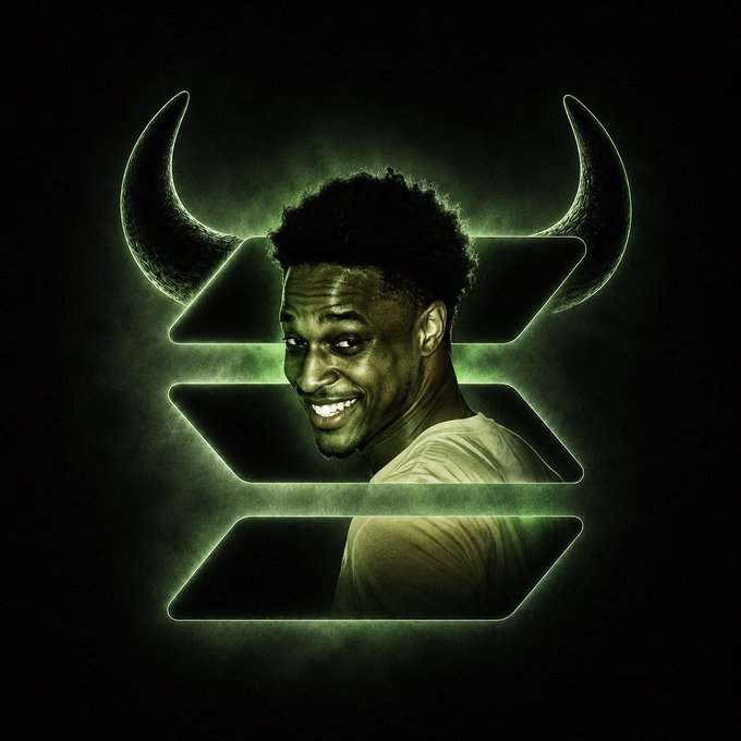 A stylized portrait of basketball player Giannis Antetokounmpo smiling, set against a dark green glowing background featuring bull horns and a stacked logo design.