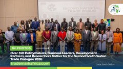 The image displays a group of people standing together, possibly at an event or gathering. The focus of the image appears to be on this group rather than any specific action taking place. It suggests that they might be posing for photos during their time together. In the caption provided in the image, it reads "#IOTA", which is likely related to the group's name or something associated with them. This information doesn't provide much insight into the context of the image but does connect the two pieces of text present at the bottom left corner and right side of the image.
