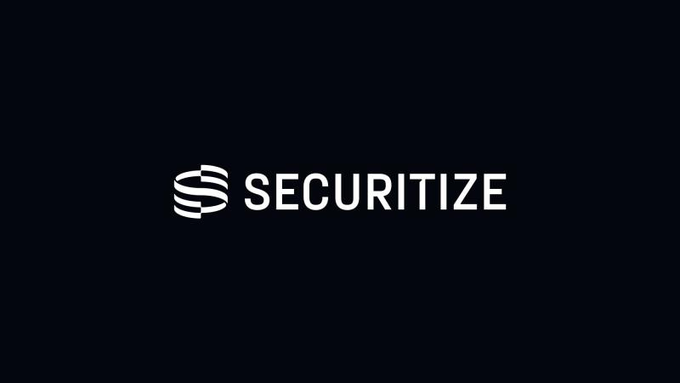 The image displays the Securitize logo, featuring a stylized "S" icon next to the company name "SECURITIZE" in white text on a black background. This branding aligns with the post's announcement that Securitize plans to pursue acquisitions with a $400 million war chest as it enters its next growth phase in institutional tokenization.