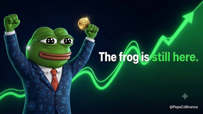 Pepe the Frog wearing a patterned blue suit holds up a gold Bitcoin, with the text 'The frog is still here.' against a rising green chart and the handle '@PepeCzBinance'.