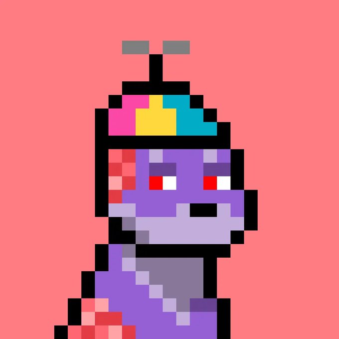 A pixel art character in purple with a colorful hat (pink, yellow, and teal) and red eyes against a solid coral pink background.