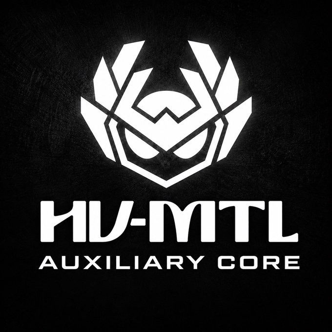A bold logo featuring a stylized white mecha-like emblem with sharp angular armor plating and a helmeted face design, set against a textured black background, with the text "HV-MTL AUXILIARY CORE" displayed prominently below in blocky white lettering.

The image serves as the official branding reveal for the HV-MTL Auxiliary Core, visually representing the new iteration referenced in the post, replacing the previous "Deactivated" status.