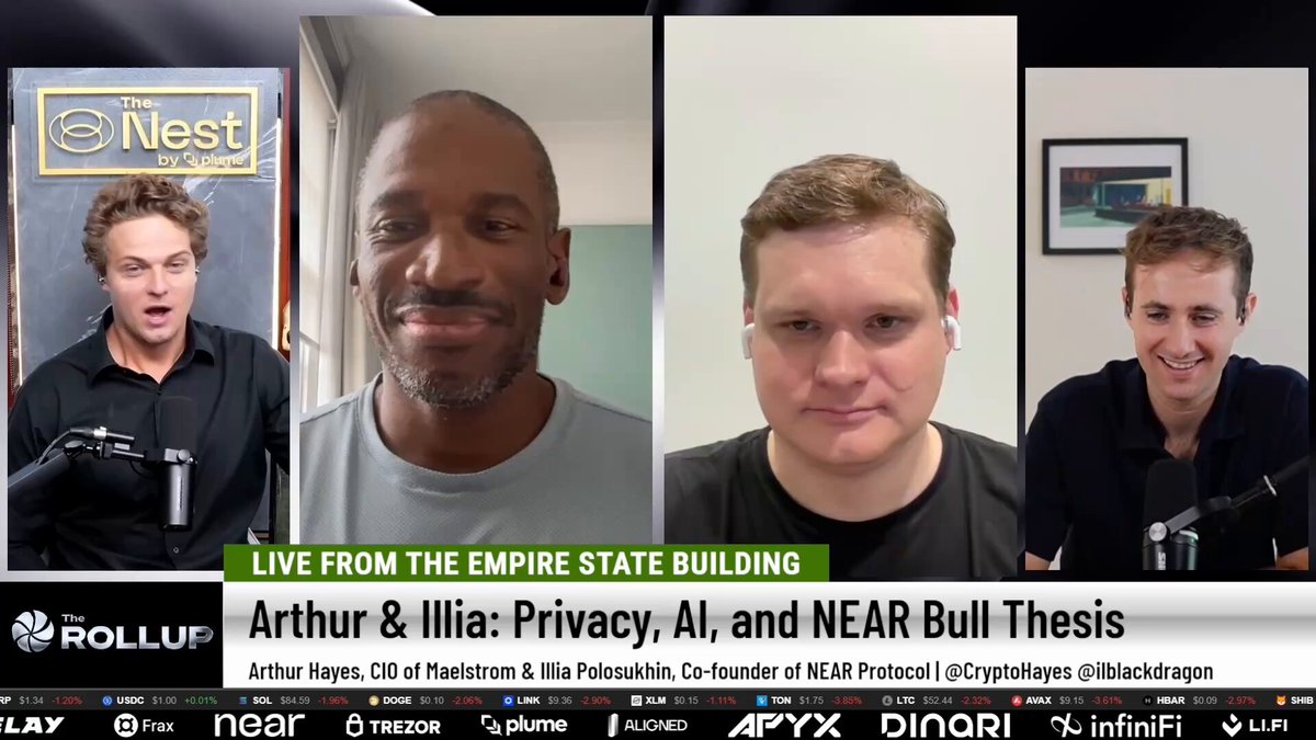 The image shows four men with different facial expressions, all wearing black shirts, sitting behind a table. The text "Live from The Empire State Building" appears at the top of the image, while "NEAR AI" is written below them. The caption reads "Focus on what is in the image and how it relates to the post."