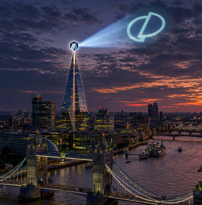 A nighttime cityscape of London showing Tower Bridge and the Shard, with the PIPO logo projected as a searchlight beam in the sky.