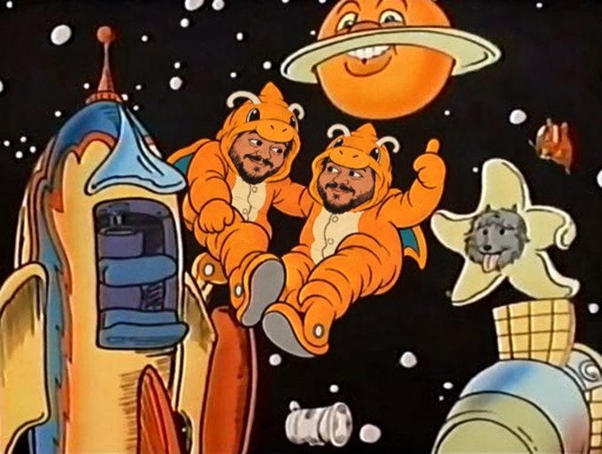 A whimsical space-themed illustration featuring two figures in orange bear suits, a smiling planet with a ring, a rocket, and a star with a wolf's face.