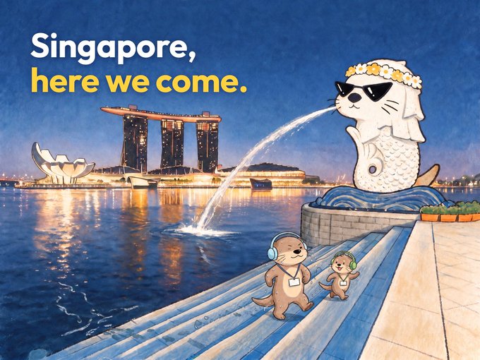 An illustration featuring the Merlion statue in Singapore with the text 'Singapore, here we come.', alongside two cartoon otters, with the ArtScience Museum and Marina Bay Sands in the background.