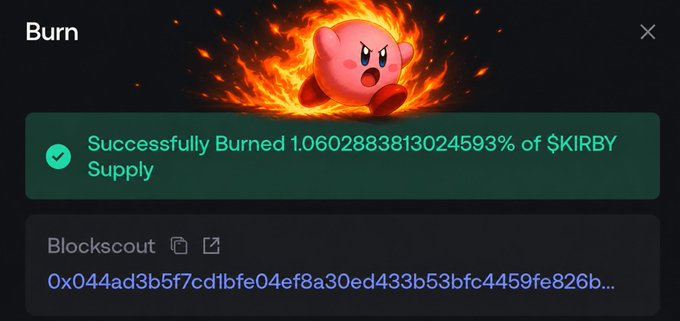 A crypto token burn confirmation showing 'Successfully Burned 1.0602883813024593% of $KIRBY Supply' featuring Kirby character engulfed in flames, with a Blockscout transaction link beginning '0x044ad3b5f7cd1bfe04ef8a30ed433b53bfc4459fe826b...'