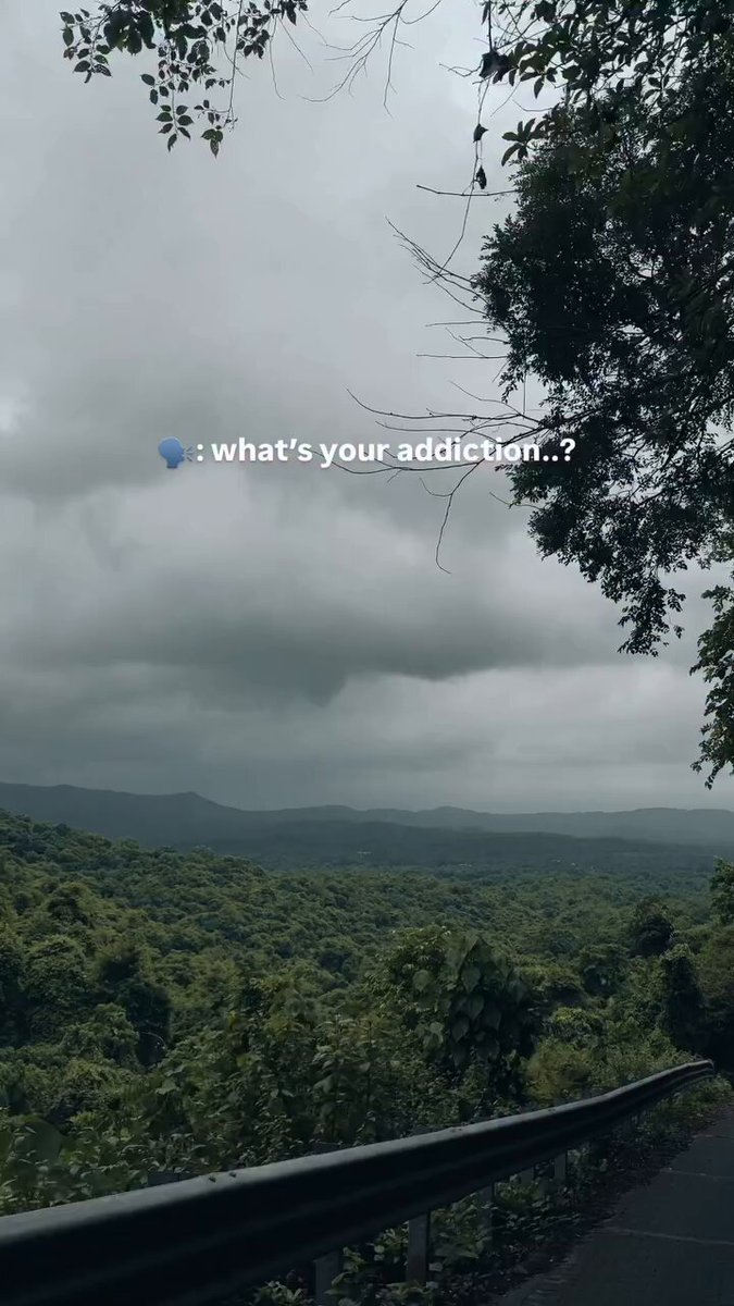 The image features a road with trees lining both sides, creating a serene atmosphere. The sky above appears cloudy, adding an element of mystery to the scene. In the foreground, there's a black railing that contrasts with the natural surroundings. On this railing, there is text written in white letters that reads "I think that the future of blockchain is not only limited to a main chain, but is moving towards the creation of separate appchains according to the project CNPY looks quite interesting at this point". The image seems to be related to the post about blockchain and its potential applications.