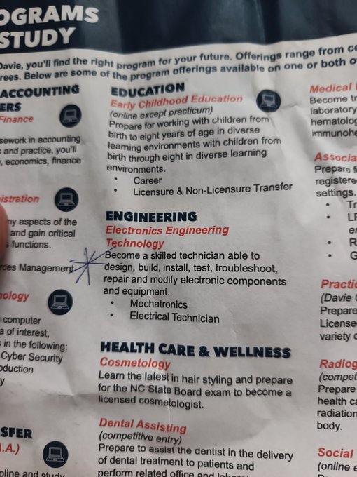 A close-up of a printed 'PROGRAMS OF STUDY' brochure listing program offerings including Early Childhood Education (EDUCATION), Electronics Engineering Technology (ENGINEERING) with a hand-drawn star marking, Cosmetology and Dental Assisting (HEALTH CARE & WELLNESS), along with Accounting and other categories.