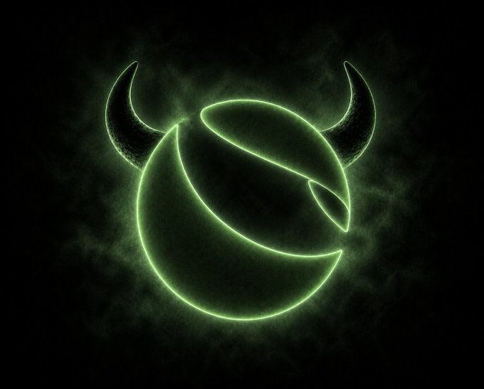 A glowing green neon-style illustration of a horned, spherical creature or mask surrounded by smoky mist, paired with the hashtag "#LUNC" to represent the Terra Luna Classic cryptocurrency. The mythical, monstrous design evokes the token's branding and adds an edgy, dramatic flair to its online identity.