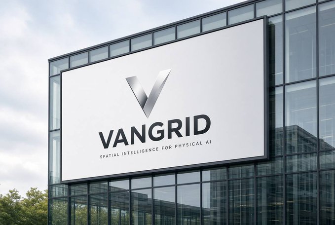 A large outdoor billboard mounted on a modern glass building displays the Vangrid logo and the tagline 'SPATIAL INTELLIGENCE FOR PHYSICAL AI'.