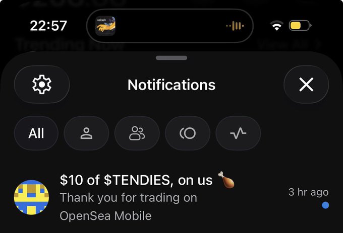 A smartphone notification screen from the OpenSea Mobile app showing a notification reading '$10 of $TENDIES, on us 🍗 Thank you for trading on OpenSea Mobile' received 3 hours ago, with the time showing 22:57.