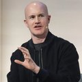 Brian Armstrong, CEO of Coinbase, gestures while speaking during a public appearance, addressing criticism over the cryptocurrency exchange's decision not to list the controversial Blake coin, emphasizing Coinbase's commitment to responsible discretion in its listings.