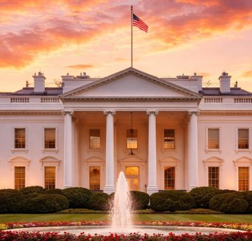 The White House is illuminated at sunset, its neoclassical façade and central fountain framed by a vibrant orange and pink sky. The image visually reinforces the post's "BULLISH" sentiment by representing the seat of U.S. executive power from which the official's optimistic remarks on the Crypto Clarity Act were issued.