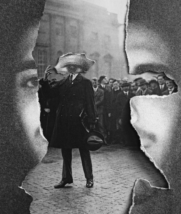 A surreal black-and-white photomontage shows a figure in a long coat and hat standing on a cobblestone street, with a crowd of men behind him, framed by torn paper-like textures. The accompanying post "GM" likely refers to a greeting, suggesting the figure's raised hand is waving hello.