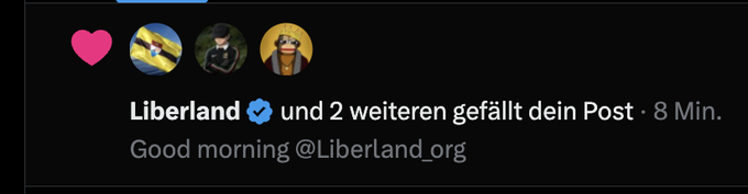 A social media notification in German showing that 'Liberland' (verified) and 2 others liked a post, with the caption 'Good morning @Liberland_org' posted 8 minutes ago.