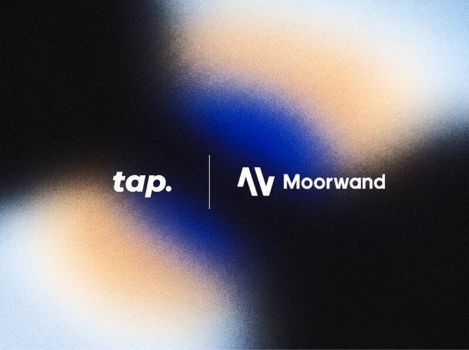 A logo graphic displaying 'tap.' and 'AV Moorwand' separated by a vertical line, set against a blurred dark background with orange and blue light streaks.