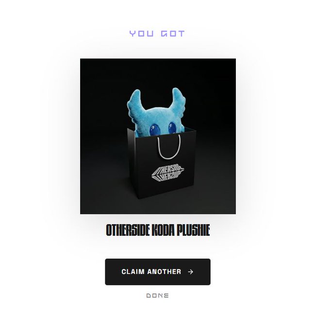 The image shows a stuffed animal, specifically a blue monster plush toy, sitting inside an open black shopping bag. The text "You got it!" is displayed above the stuffed animal, indicating that the user has successfully completed their purchase or won a prize.