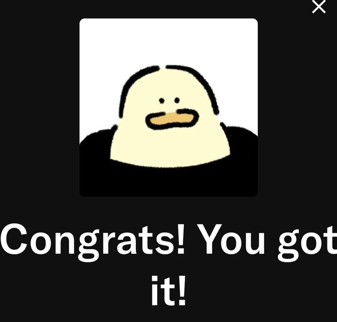 The image features a cartoon duck with a big smile, sitting against a black background. The text "congrats! You got it!" is written above the duck's head, indicating that someone has achieved something or completed a task successfully.
