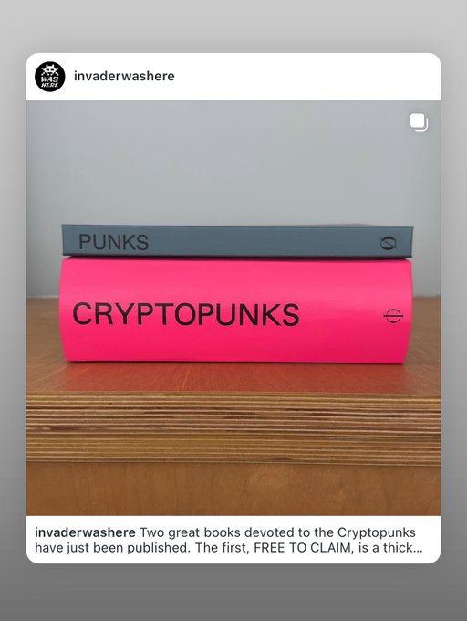 An Instagram story post from @invaderwashere announcing two books devoted to Cryptopunks, showing a gray 'PUNKS' book and a pink 'CRYPTOPUNKS' book.
