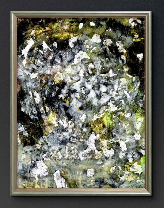 A framed abstract painting with thick impasto texture featuring chaotic black, white, and yellow-green brushstrokes with hints of pink, creating an expressionist composition.