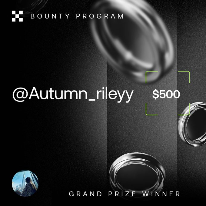 A promotional graphic from the OKX Bounty Program announces "@Autumn_rileyy" as the $500 Grand Prize Winner, featuring a dark background with metallic ring designs and a small profile photo of the winner. The image visually celebrates the achievement mentioned in the post, highlighting her username and prize amount alongside the program's branding.