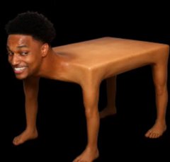 A surreal digital composite image on a black background showing a wooden table with human arms and legs attached to its corners, with a smiling man's face in the top-left corner.
