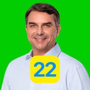A smiling man in a light blue button-down shirt is pictured against a green background, with a yellow square icon displaying the number '22' overlaid on his chest.