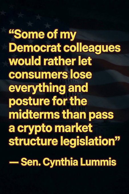 The image features a quote from Sen. Cynthia Lummis in yellow text overlaid on a darkened American flag background, reading: "Some of my Democrat colleagues would rather let consumers lose everything and posture for the midterms than pass a crypto market structure legislation."

The graphic highlights Lummis's criticism of Democrats for blocking crypto legislation, directly complementing her post which argues that the bill includes ethics provisions requiring President Trump to divest digital assets, yet Democrats are allegedly prioritizing political posturing over consumer protections ahead of midterm elections.