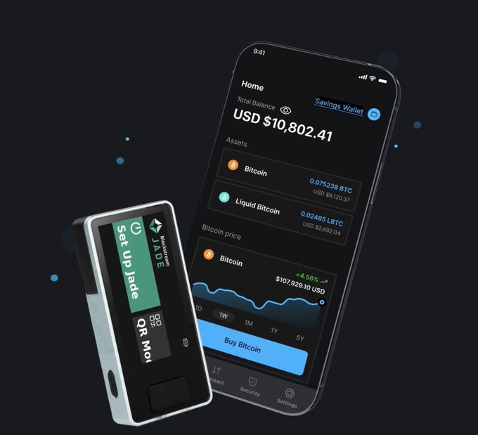 A promotional product image showing a smartphone displaying a Bitcoin/crypto wallet app with a balance of 'USD $10,802.41' alongside a hardware wallet device labeled 'Set up Jade' with 'JADE' and 'QR' on its screen.
