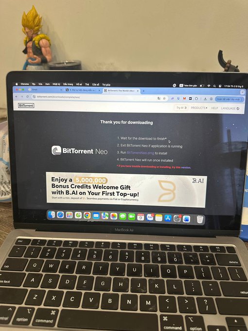 The image shows an open laptop computer with a web browser window displaying a BitTorrent website. The screen also features a banner promoting Bit Torrent Neo for macOS, suggesting that the user may be considering upgrading their operating system or device to take advantage of this particular product.