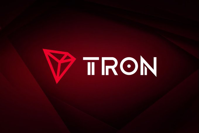 The image features a logo with the word "TRON" written in white letters against a red background. The logo is positioned at the top of the image, drawing attention to its prominence. The text "The best technology isn' the one people talk about the most." is also present within the image, providing context and reinforcing the idea that TRON is an important aspect of modern technology.