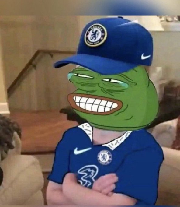 A Pepe the Frog meme wearing a Chelsea FC cap and jersey shows a smug, grinning expression with arms crossed. The image humorously represents someone in web3 since 2022 mocking newcomers (newbies) who compare their short experience to veterans, conveying the "better no wound yourself" sentiment through Pepe's taunting, self-satisfied smirk.