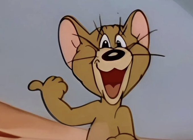 Jerry the mouse from "Tom and Jerry" gives a wide, enthusiastic thumbs-up while grinning from ear to ear, perfectly mirroring the overly optimistic energy of someone endorsing their friend's naive crypto career pivot.