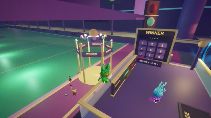 A vibrant 3D game environment featuring a green court, a 'WINNER' scoreboard displaying 'ROUND 3 - 2:39', a small green character, and a blue character with bunny ears.
