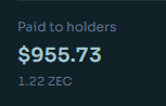 A small digital display showing 'Paid to holders' with an amount of '$955.73' representing '1.22 ZEC'.