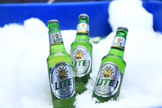 The image features three bottles of Tussock LITE beer sitting in a pile of snow, with their caps off. The bottles are arranged in a row, creating an interesting contrast between the cold, snowy environment and the warm, refreshing beverage inside. The caption "Whatever you're doing to #ownYourLite take it seriously" suggests that the image is meant to convey a message about the importance of appreciating and enjoying life's simple pleasures, like sipping on a cold beer in a snowy setting.

The snow around the bottles adds an element of whimsy and playfulness to the scene, making it even more memorable and impactful. The combination of the snow-covered ground and the warm beer creates a visually appealing contrast that captures viewers' attention and encourages them to reflect on their own experiences with similar moments in life.