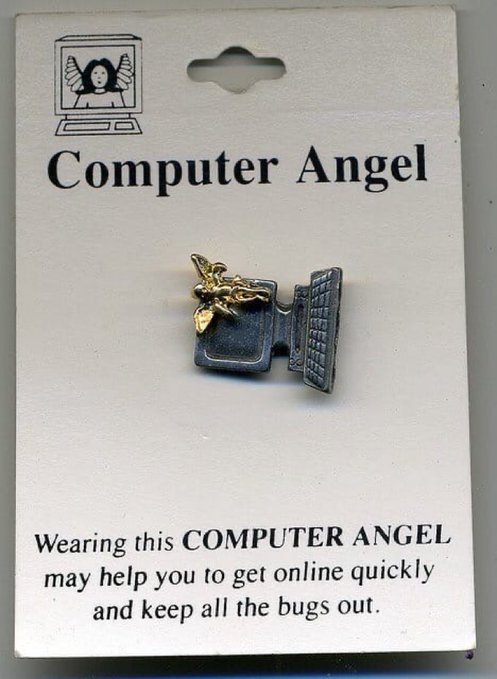 A novelty pin on a card labeled 'Computer Angel,' featuring a small gold angel next to a silver computer monitor and keyboard, with text stating it may help you get online and keep bugs out.