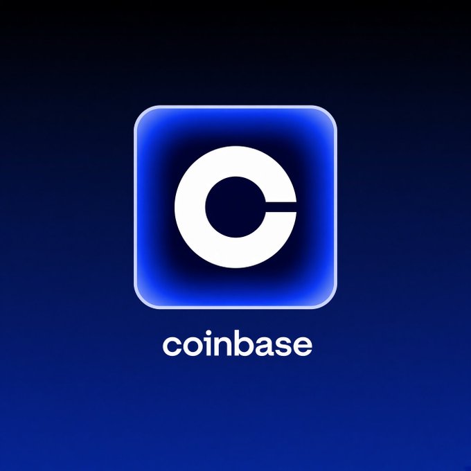 The image displays the Coinbase app icon—a white "C" logo on a glowing blue rounded-square background—above the word "coinbase." It visually represents the company mentioned in the news about Coinbase partnering with Better to offer crypto-backed mortgages.