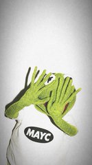 A Kermit the Frog plush toy wearing a white t-shirt with a black 'MAYC' (Mutant Ape Yacht Club) logo.