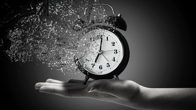 A black-and-white image shows an analog alarm clock dissolving into particles on an open hand, symbolizing the countdown to a timed network upgrade. The clock face displays numbers 1–12, visually reinforcing the post’s “Zcash Prepares for NU7” announcement, which mentions Zebra 7.0.0 and reducing block times from 75 to 25 seconds.