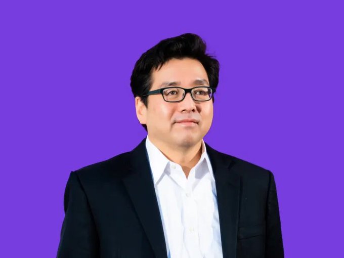 Tom Lee, wearing glasses and a dark suit, is pictured against a purple background, with the post noting his participation in DeFi Development Corp.'s $11M SOL-backed $CHAD offering and his growing interest in Solana ($SOL) alongside Ethereum ($ETH) and Bitcoin ($BTC).