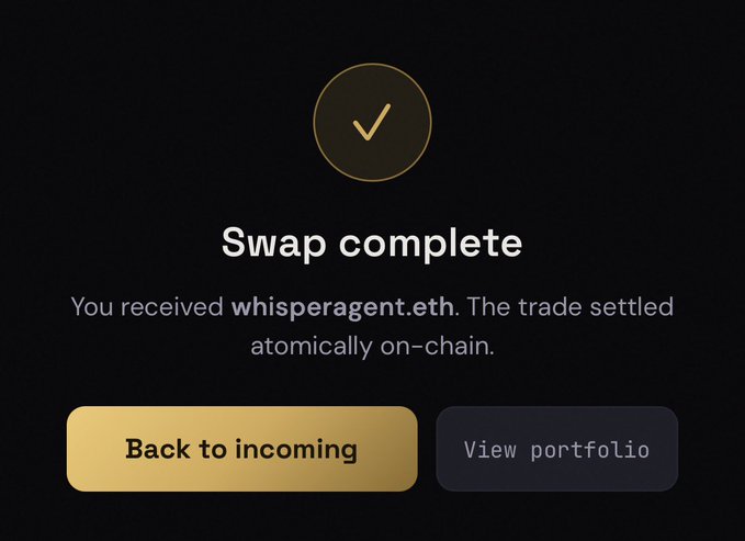 A screenshot of a phone screen featuring the text "Swap complete", which appears at the bottom right corner, with an arrow pointing towards that text. Below this text there's a gold button. The background of the screen is black, providing contrast for the white and yellow elements on display.