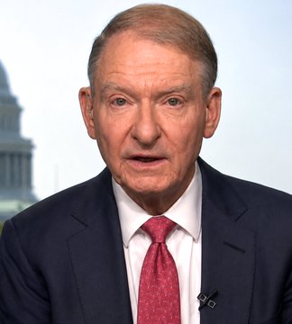 The image shows SEC Chair Paul Atkins, an older man with gray hair wearing a dark suit, white shirt, and red patterned tie, speaking during what appears to be a televised interview with the U.S. Capitol building visible in the background. His appearance directly corresponds to the accompanying post, in which he is quoted expressing his commitment to supporting Congress in advancing the CLARITY Act, a financial regulation bill.