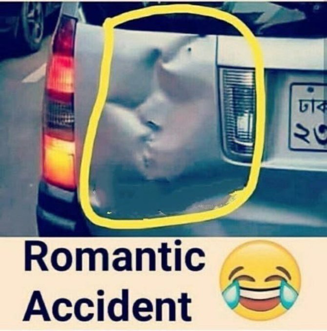 A meme featuring a dented car bumper with the reflection of a kissing couple, circled in yellow, captioned 'Romantic Accident' with a laughing-crying emoji.